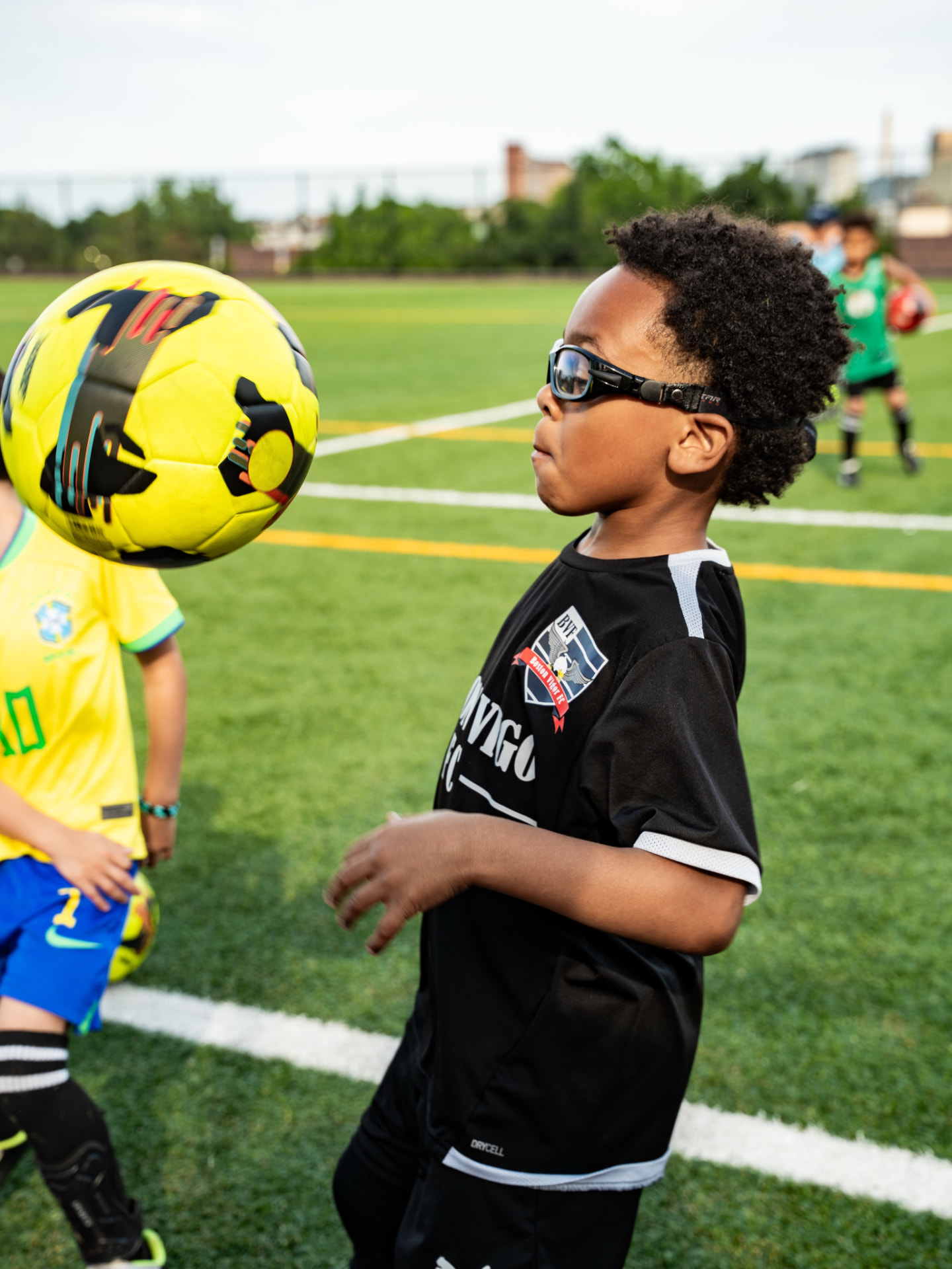 Young Vigor player controlling the ball with his head during training